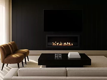 Frame 1200SS by EcoSmart Fire brings inviting ethanol fireplace warmth to indoor living rooms, blending function and design for home comfort.
